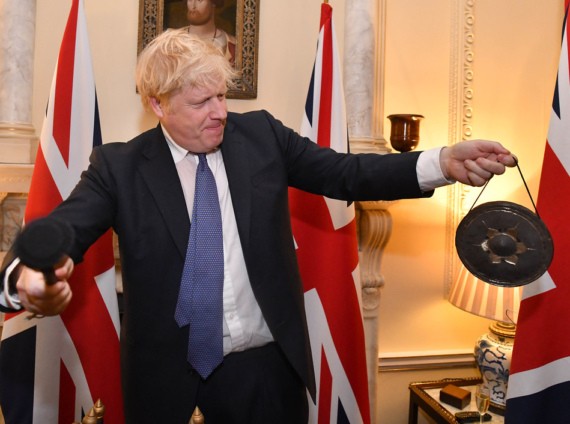 Boris Johnson banging a gong