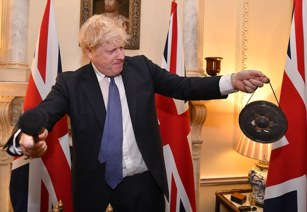Boris Johnson banging a gong