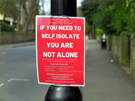 A poster for a mutual aid group that reads "If you need to self isolate, you are not alone"