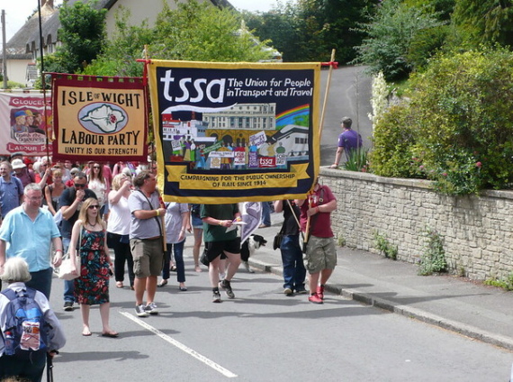 Trade Unionists march with a TSSA banner